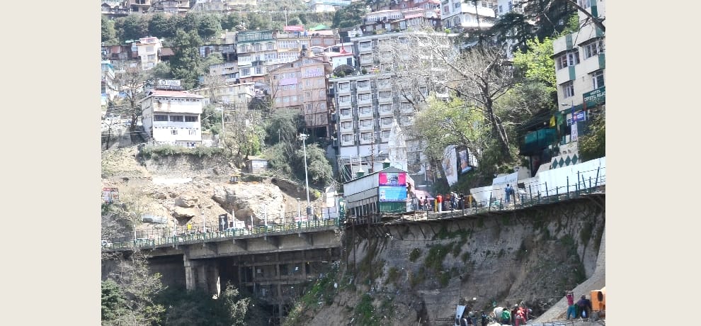 cracks on shimla circular road, traffic jam.