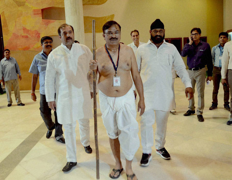 Congress MLA Dhoti protest causes uproar in Madhya Pradesh Assembly.