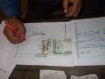 Rabrtsganj Model Inter College were stapled copy of the UP Board Exam hundred chemistry teacher's notes show.