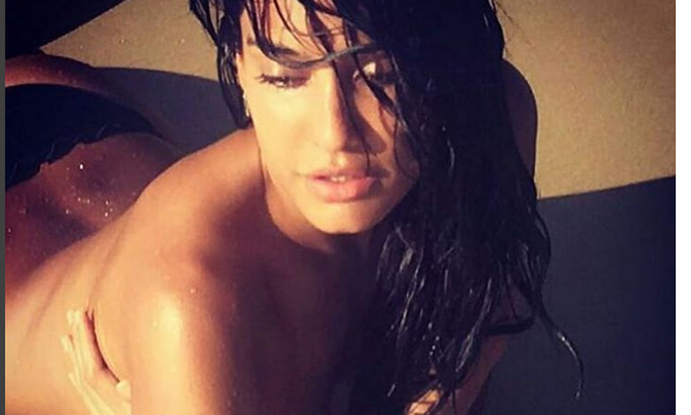 Lisa Haydon chilling on the beach