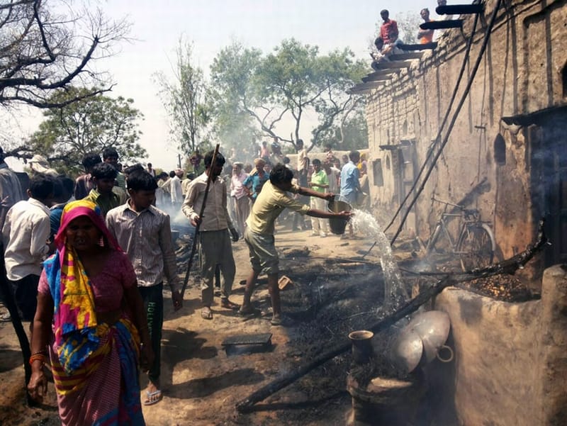 Spark of fire in the stove, half a dozen houses