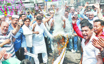  Burnt effigies of Finance , march out