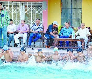 The fun of swimmers in swimming pool