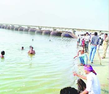 youth Immersed in the river at bathing 