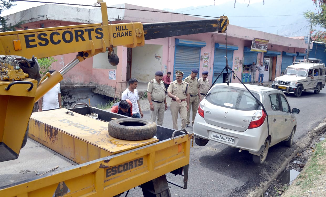 Vehicles were seized in the city crane lifted
