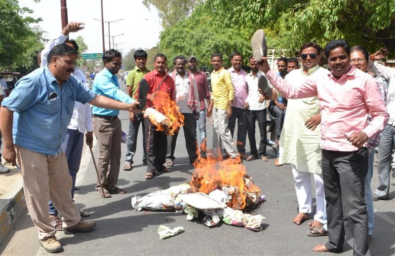 MP Madhu Mishra and burnt effigies of