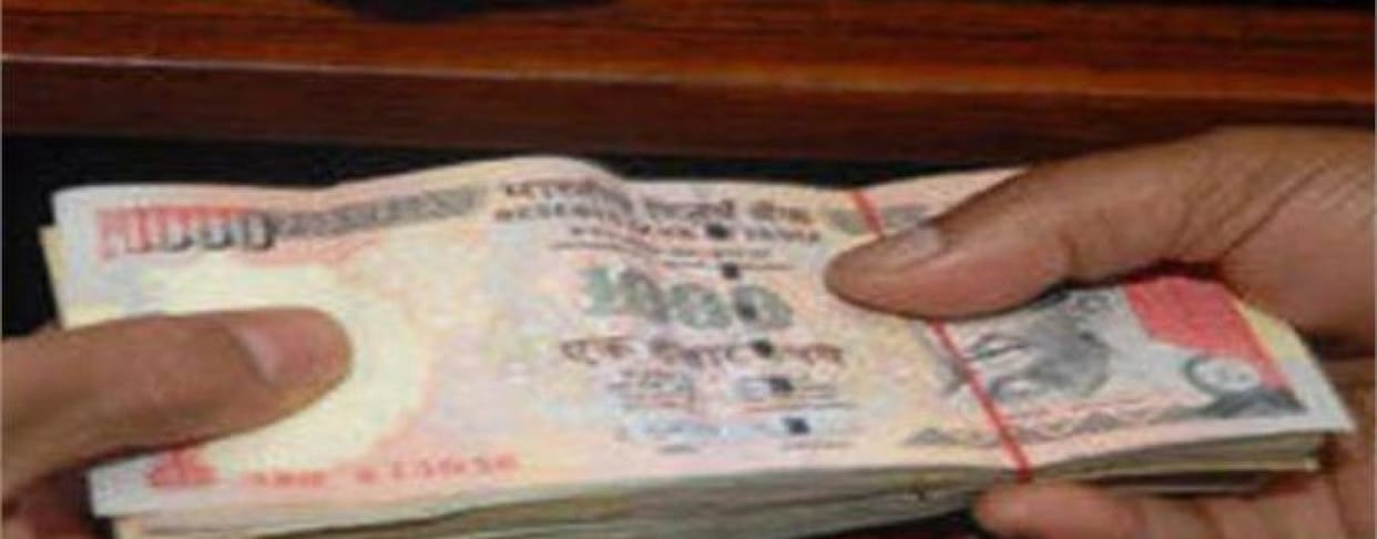 Senior Accountant arrested taking bribe.