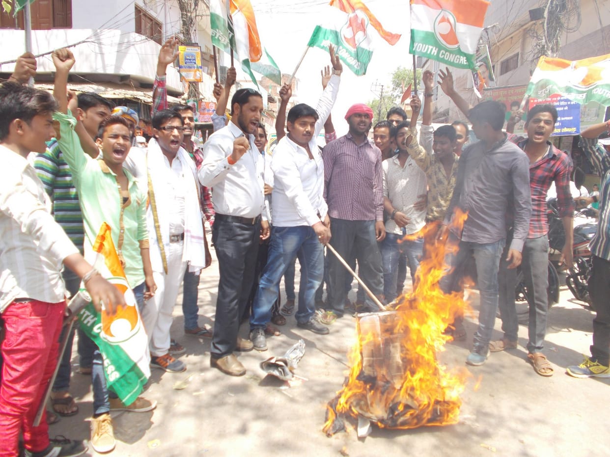 Burned effigies of Petroleum Minister