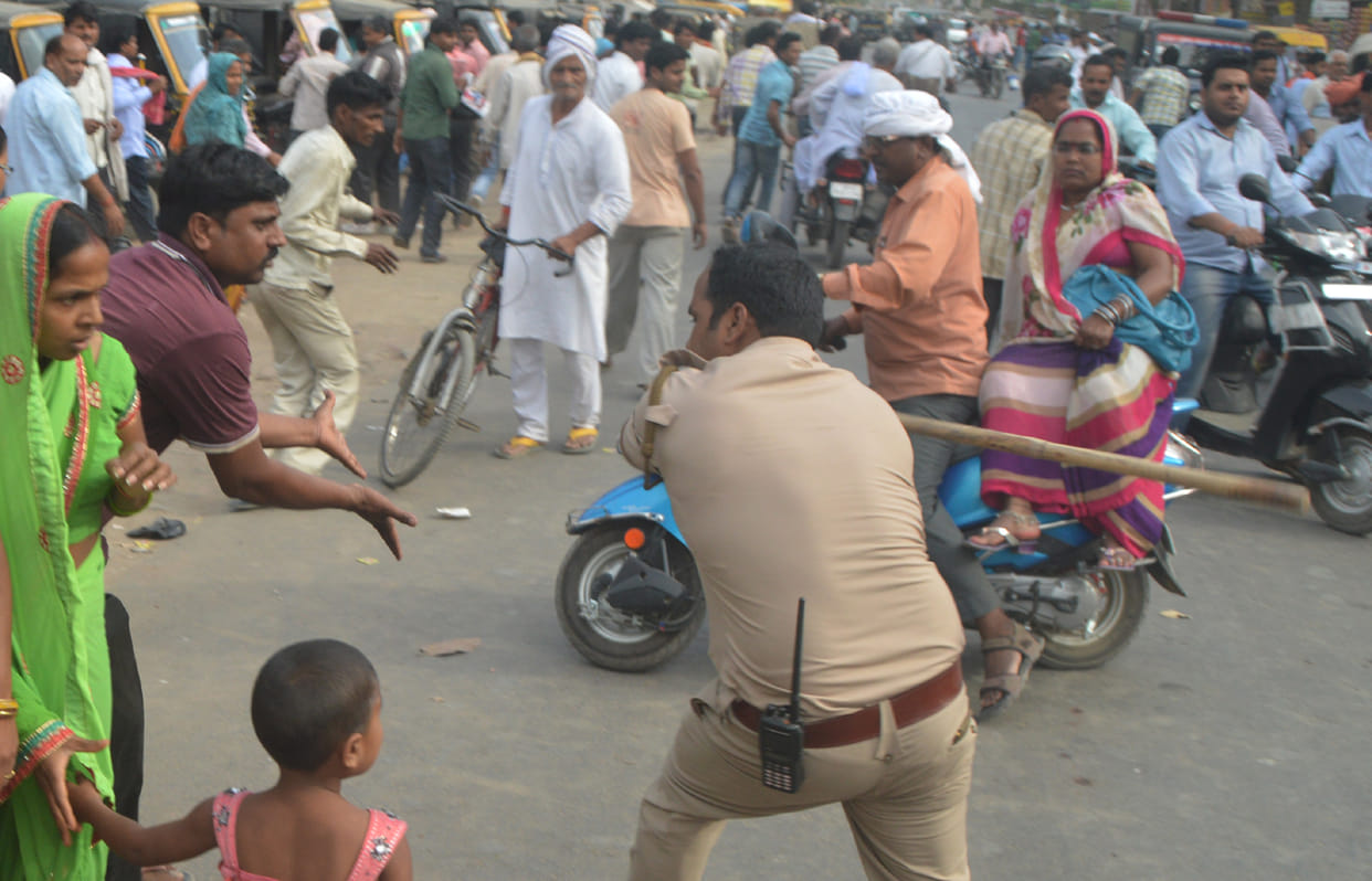 Blocked roads, threw stones at police, batons