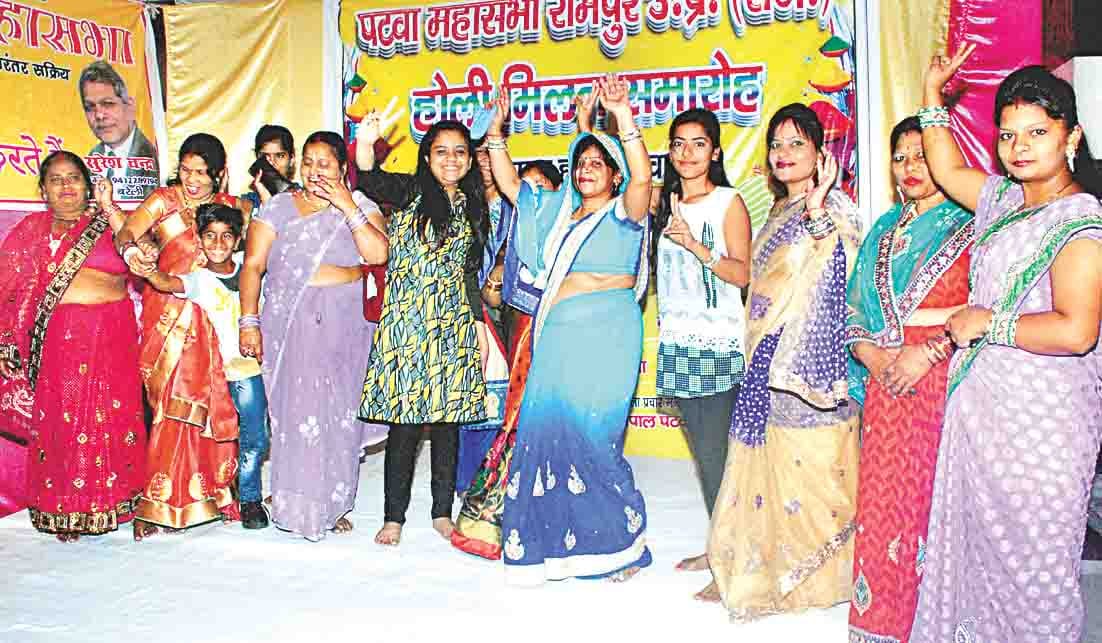 women dance on account of holi