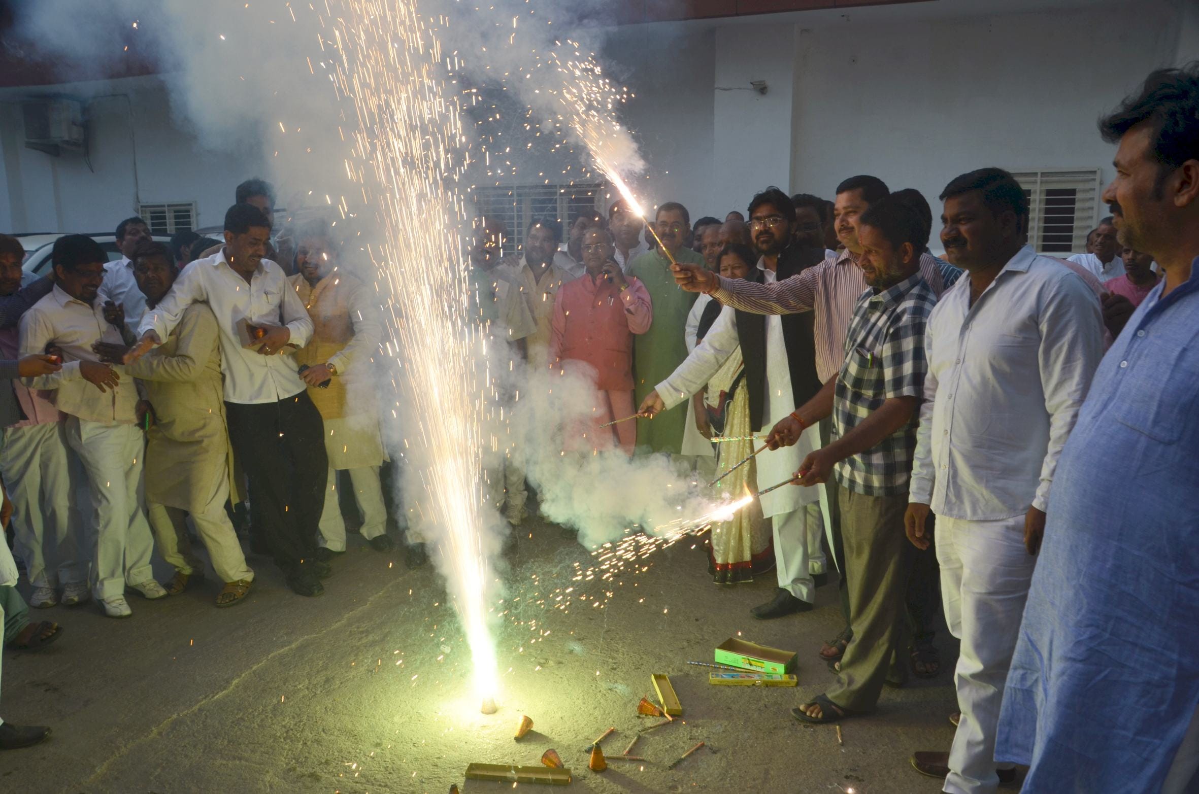 BJP activists celebrate the declaration of its UP president.