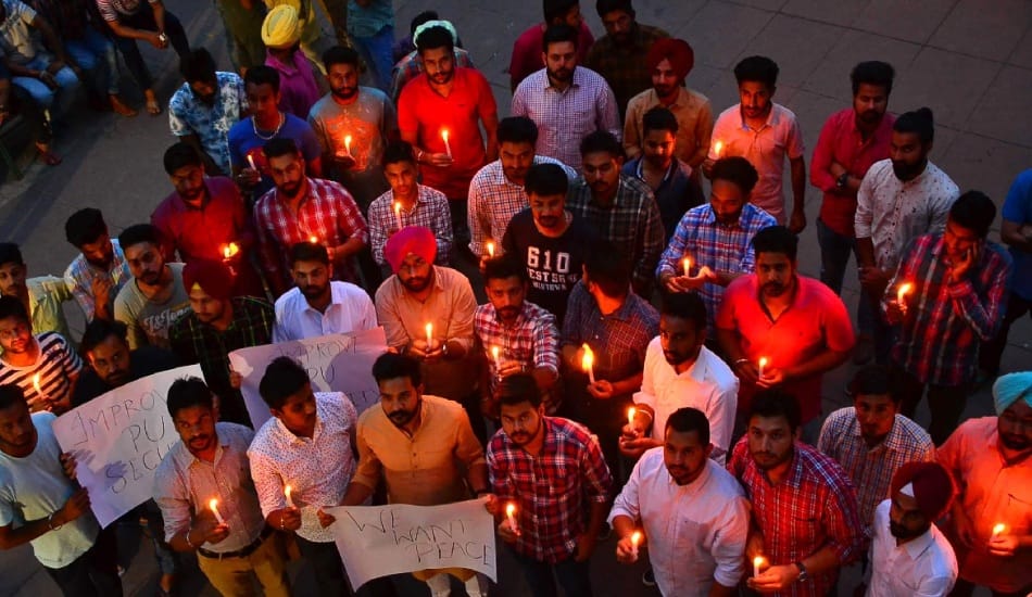 bhiwani news, candle, march, protest