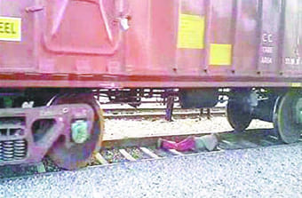 Sadhu lying on the track, passing over the train