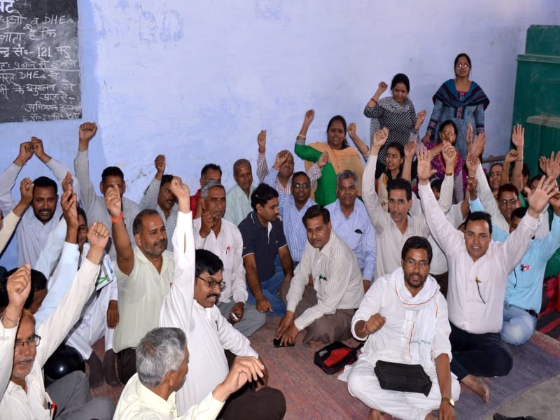 protest over transfer of teachers