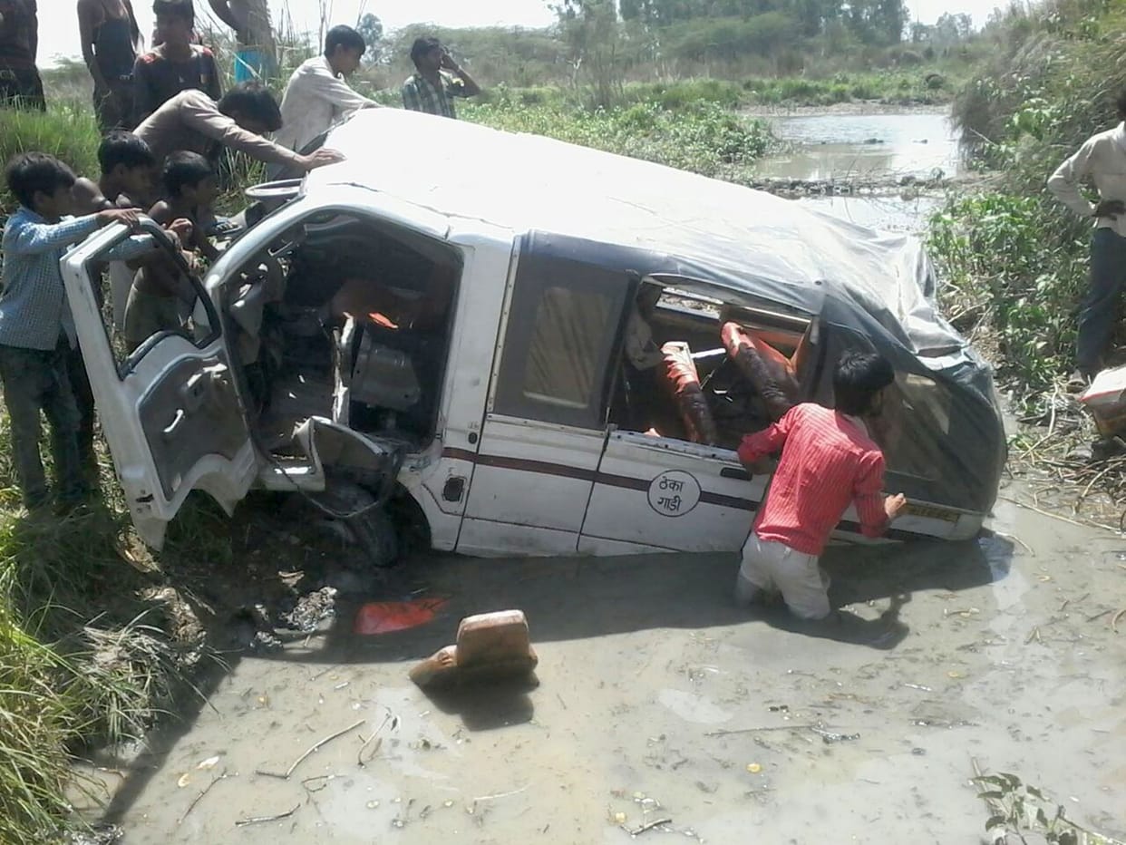 Van fell into the river, two dead