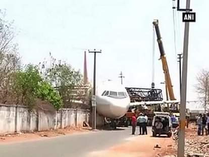 Crane carrying defunct aircraft crashes in Hyderabad