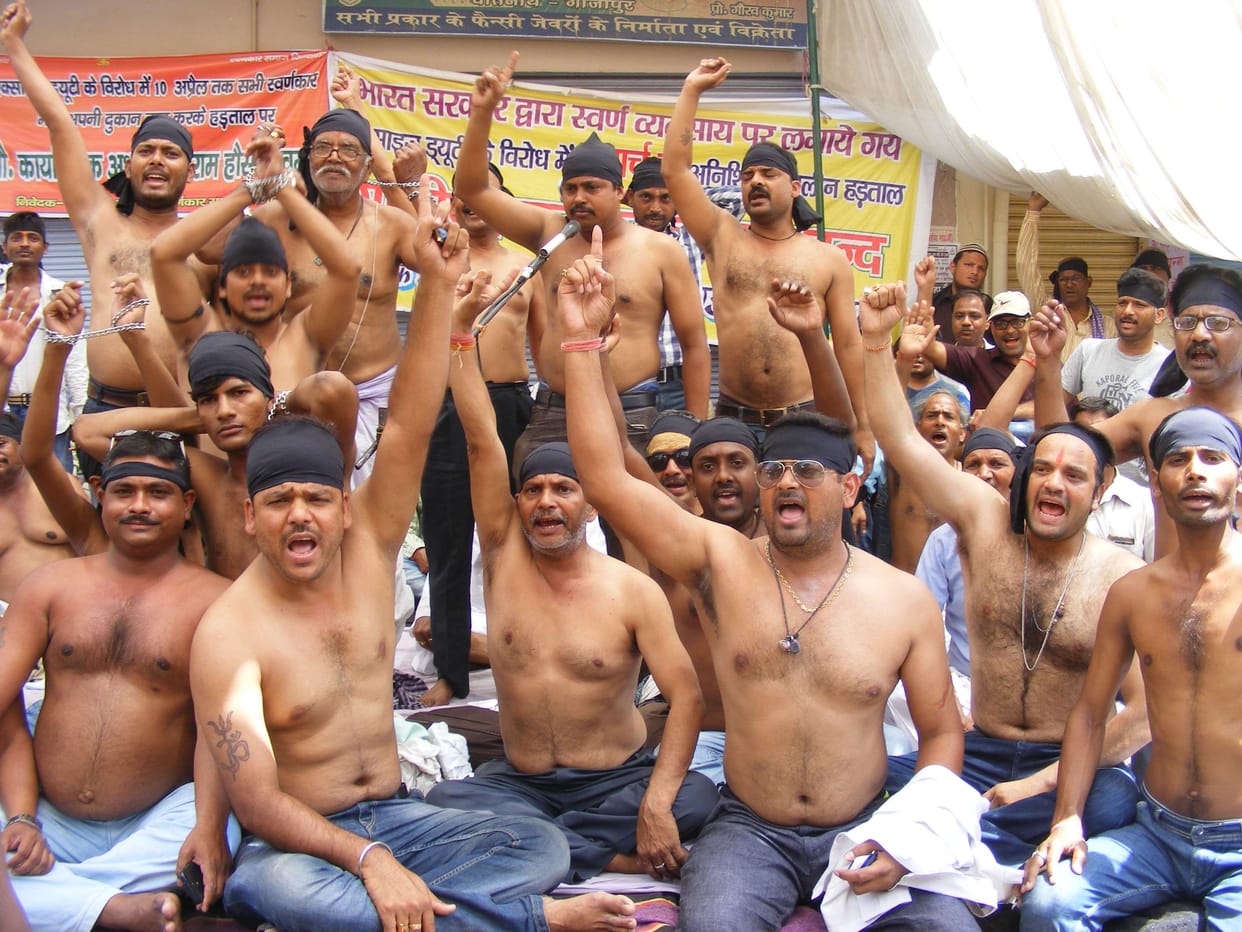Gold traders were topless protest
