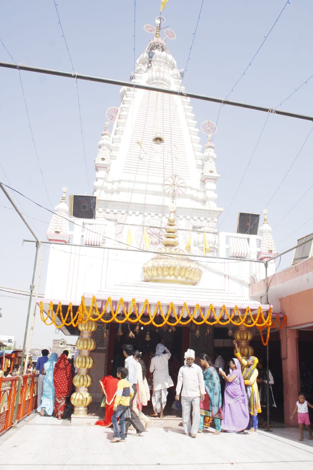 Devotees gathered in worship of the mother Brahmacharini