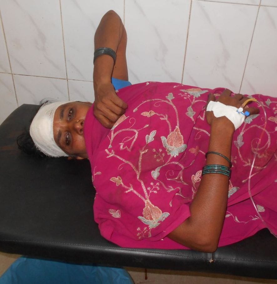 Injured woman after trapped in thresher