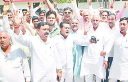 BJP members protest at cane building