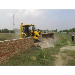 illegal coloney broke with JCB