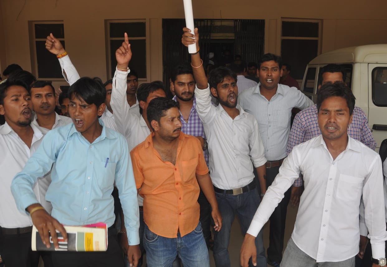 law students lock the administrative gate