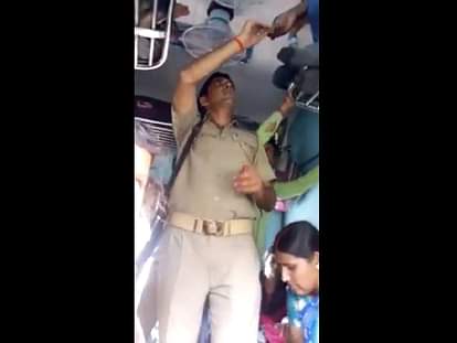 Police taking bribe for seat, captured in camera