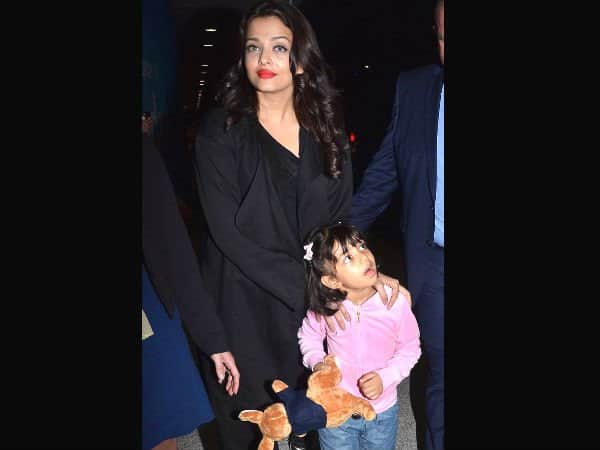 abhishek bachchan sick:Aishwarya Rai spotted at airport with aaradhya
