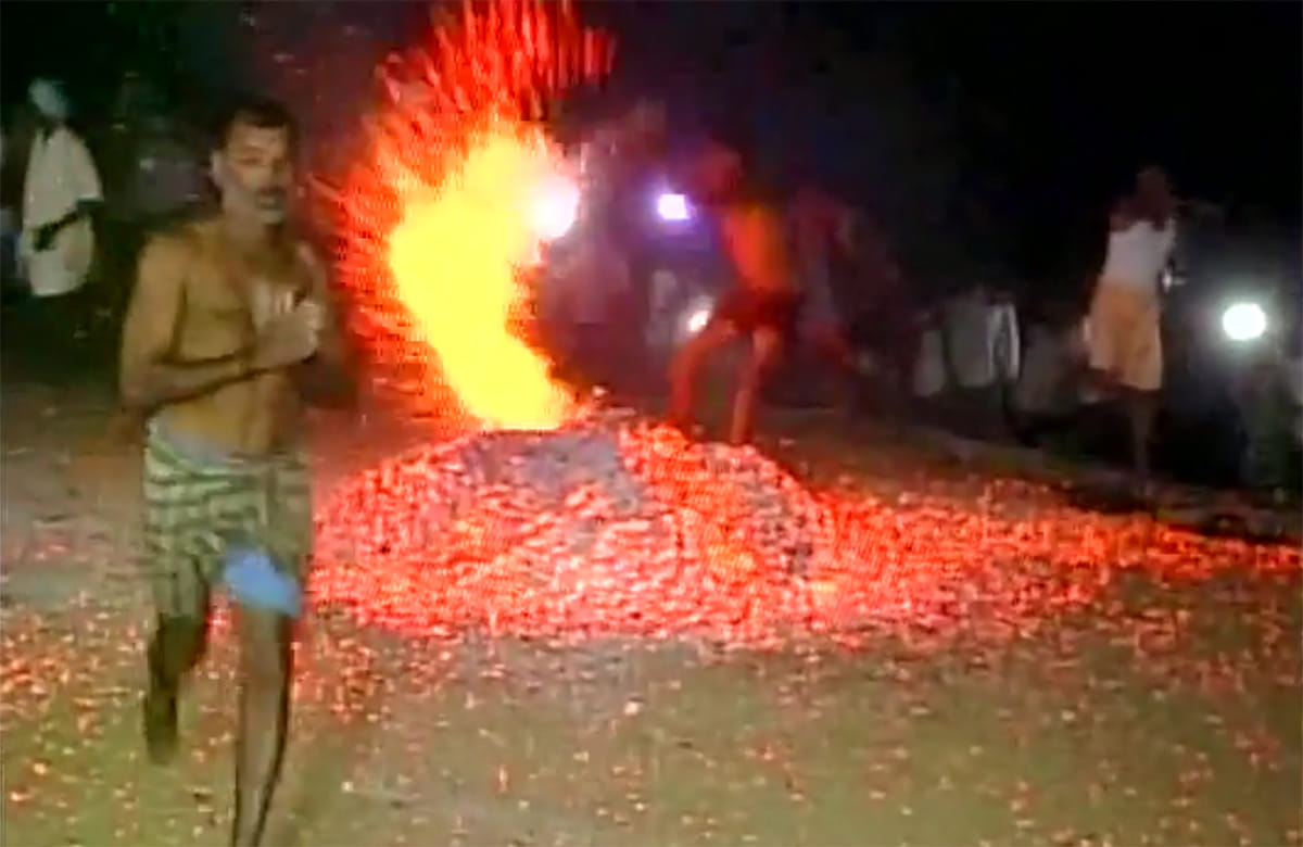 People throw burning embers at each other as a part of Ugadi festival 