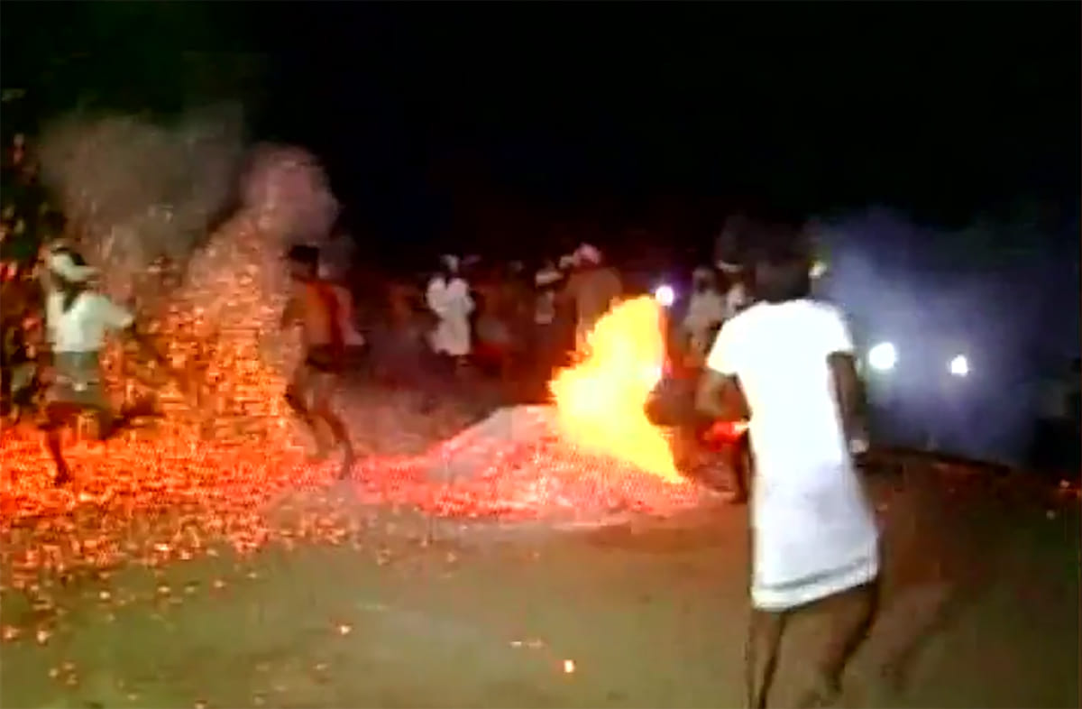 People throw burning embers at each other as a part of Ugadi festival 