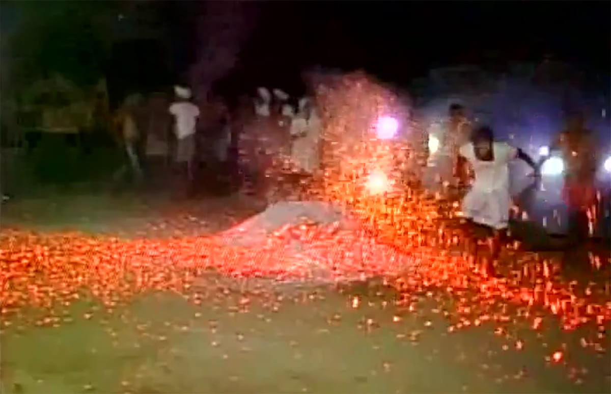People throw burning embers at each other as a part of Ugadi festival 