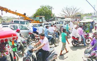 Hundreds of vehicles stuck in the jam and passer