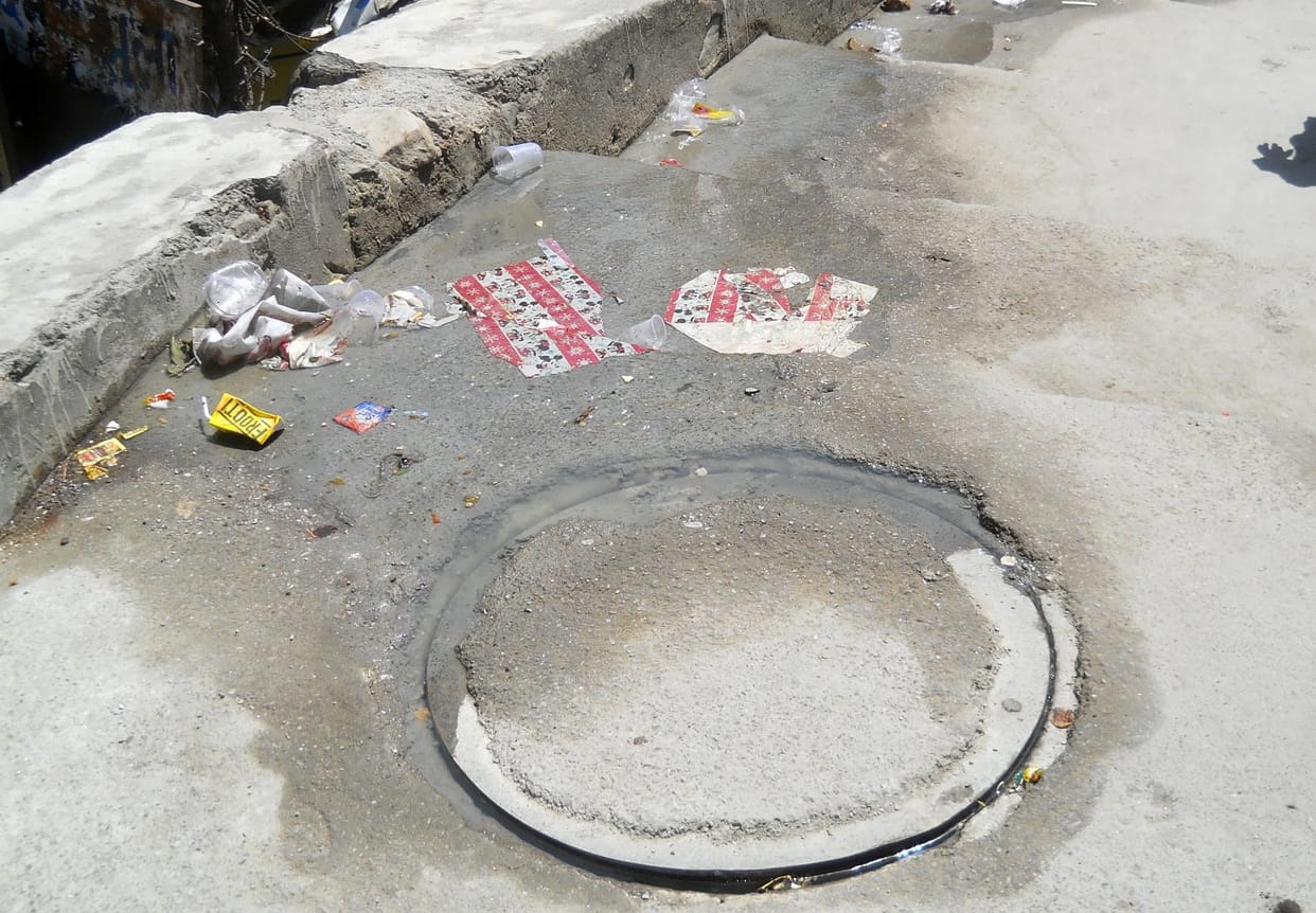 Sewer line laid out in private land made by government money