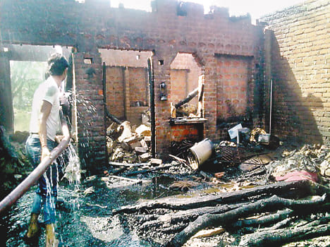 Nineteen houses on fire, 36 dead cattle burnt