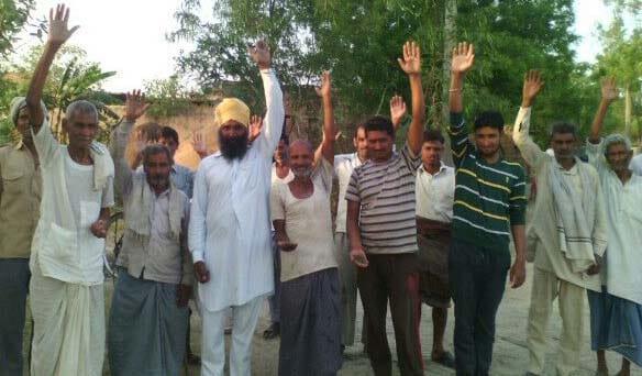 Villagers demonstrating against electricity department