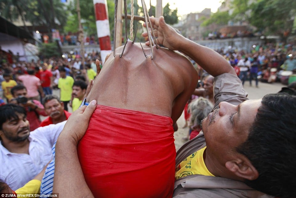 horrific pictures from the charak festival