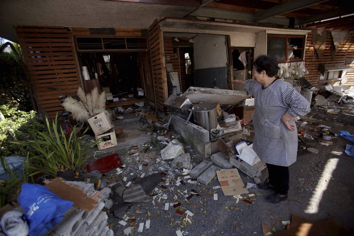 Strong quake in southwestern Japan kills nine, topples homes
