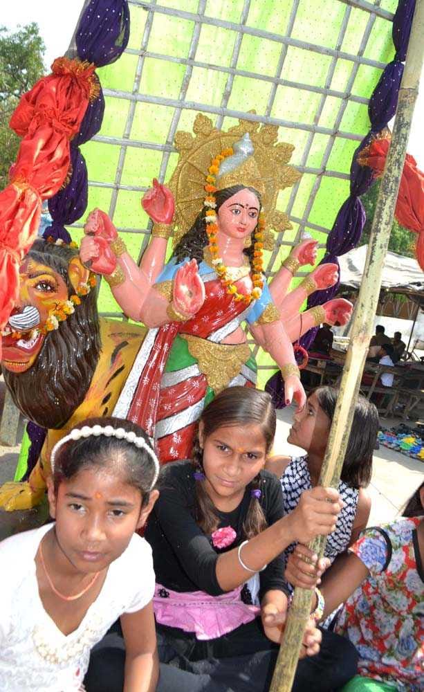 Showered flowers on the procession of Goddess Durga