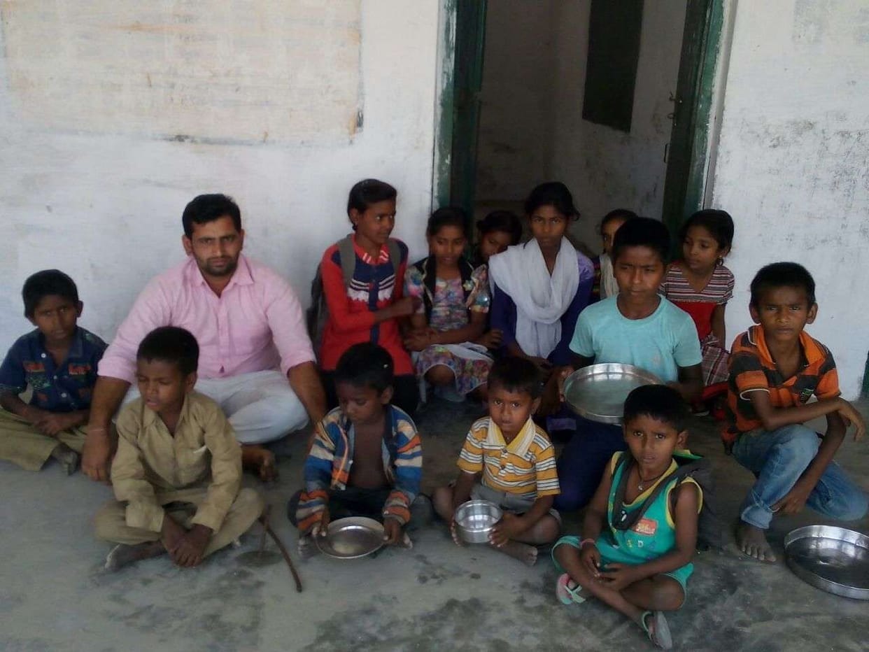Children get plate and glass