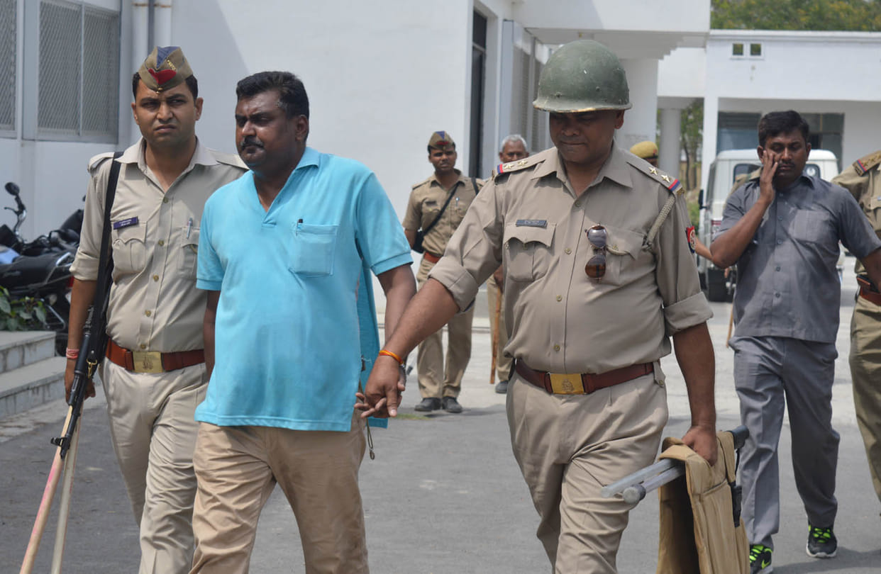 pistol  on lawyer in court