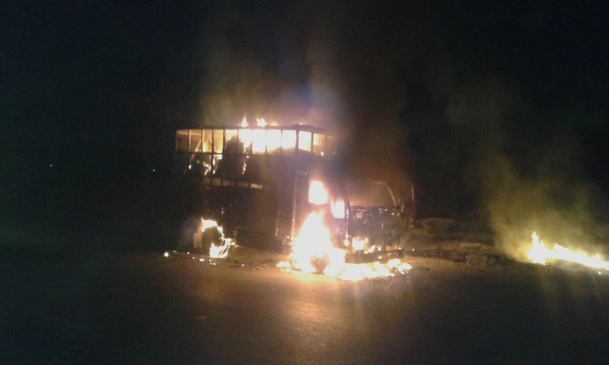 truck surrounded in flames