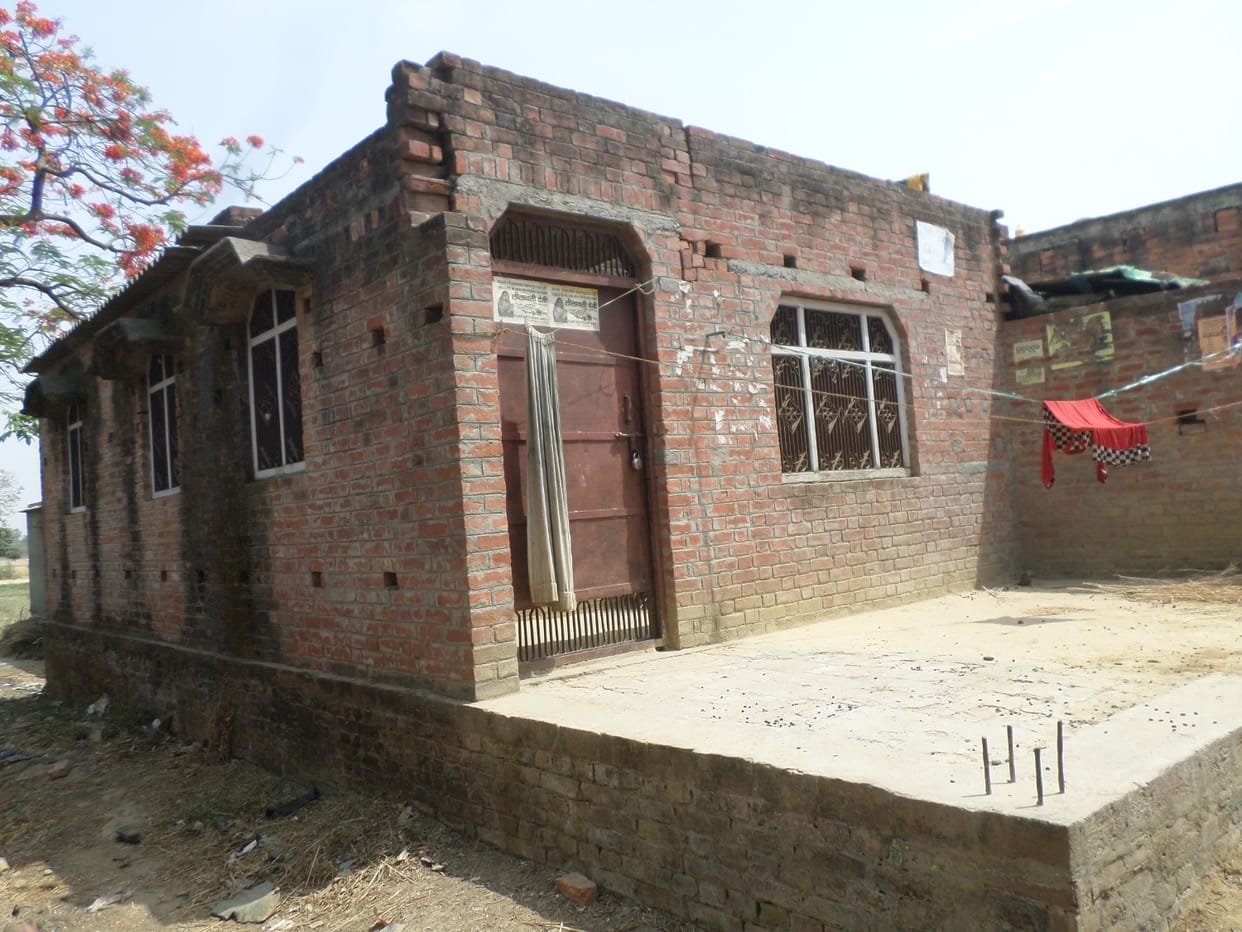 The village lies in the silence, remains tense