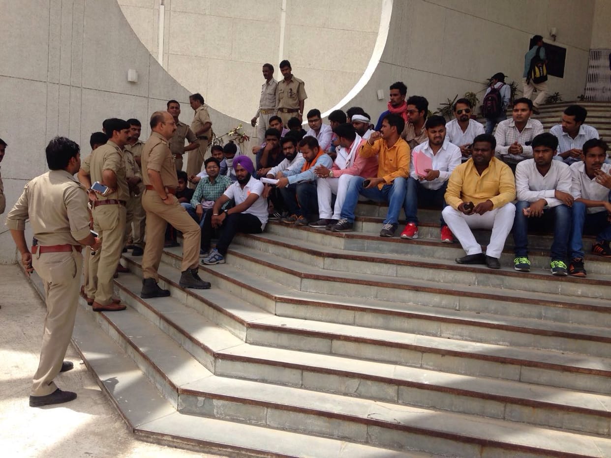 abvp students protest against professor kancha ilaiah