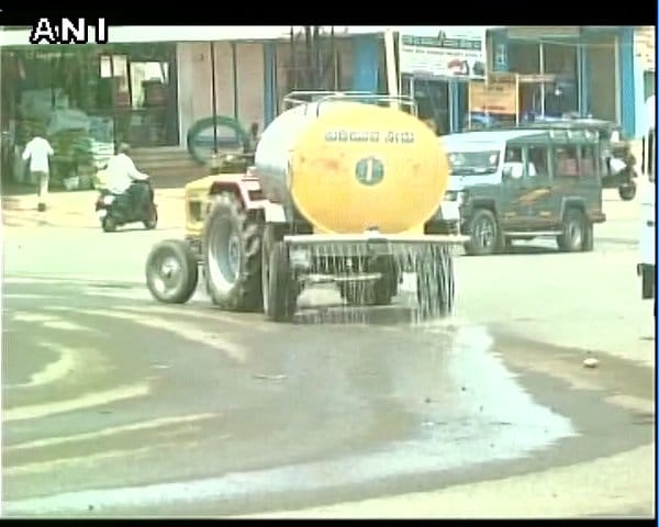 Water sprinkled on road before Karntaka CM visit to drought-hit area