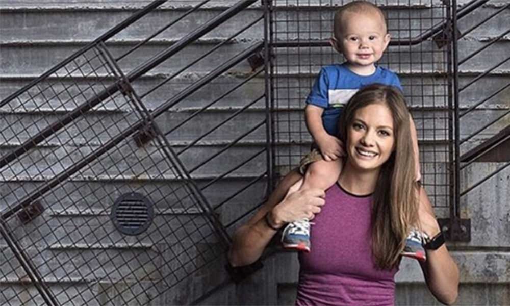 pregnant Woman exercises with 19 months toddler