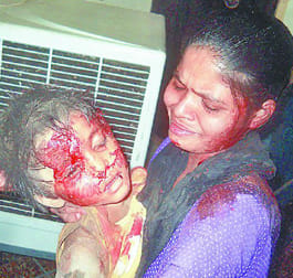 Crushed under the rubble of the wall, killing three