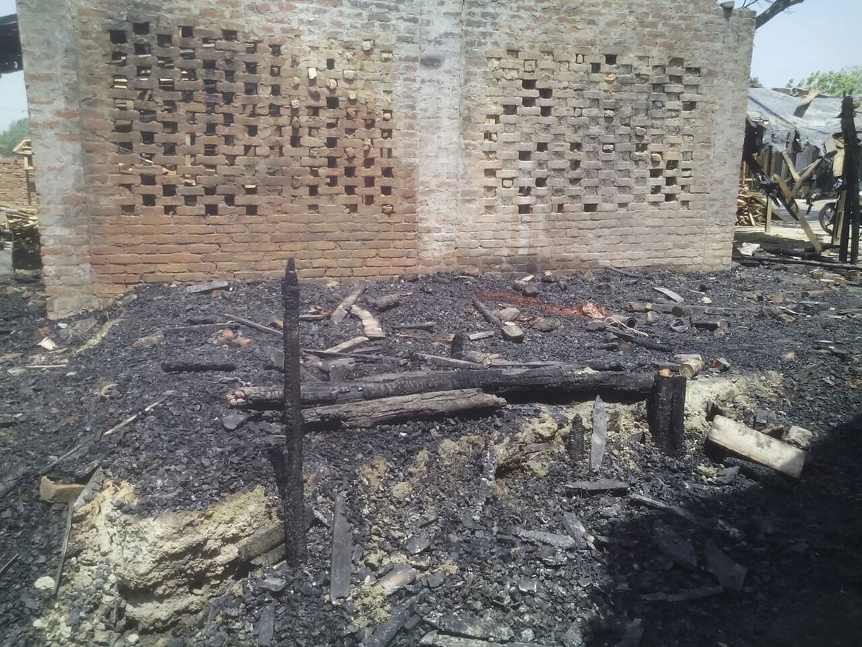 8 houses, two shops an poultry farm burnt