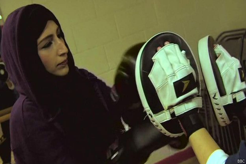 muslim woman teach about kick boxing