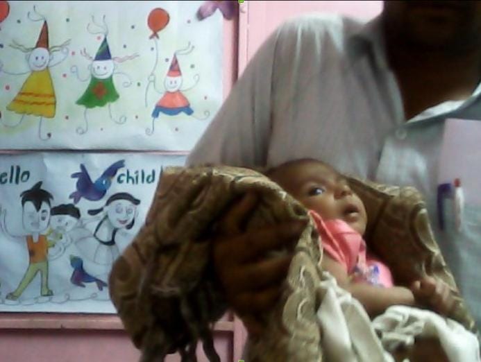 two months old girl child found in train