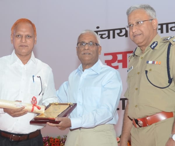 State election commissioner honours officers.
